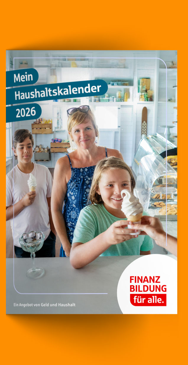 Haushaltskalender 2026 liegt auf einer orangenen Oberfläche
